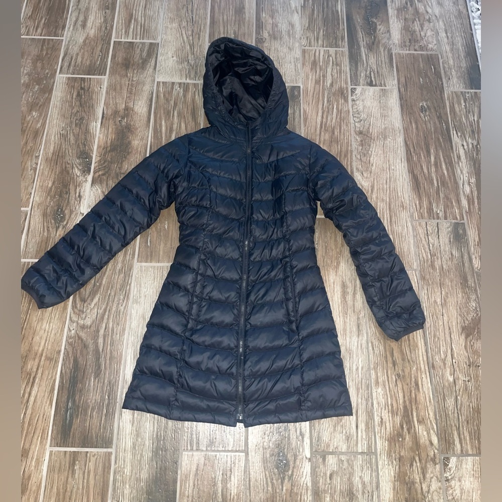 The North Face women’s black goose down long black quilted puffer jacket